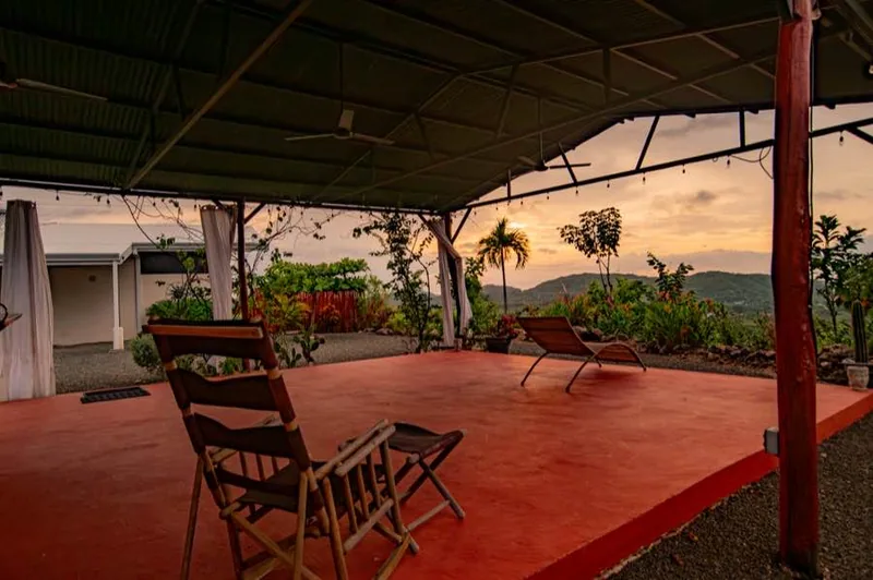 Inside the Yoga Studio at sunset, looking out over the hills