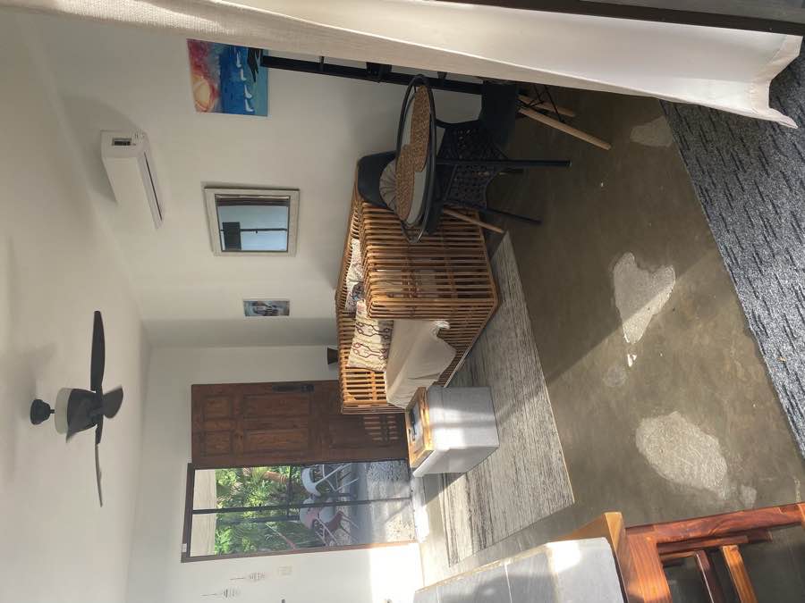 The Casa Luna living room and front door, opening onto the patio
