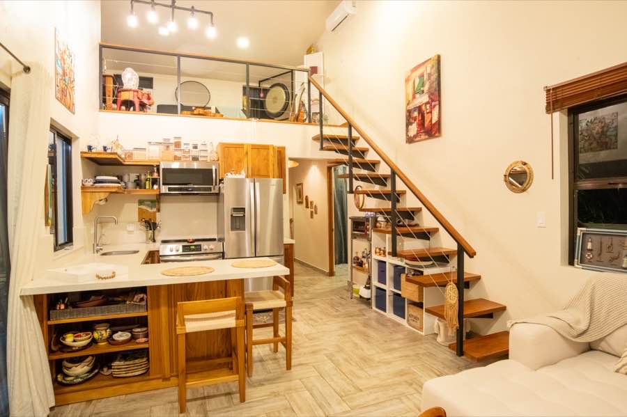 The kitchen and teak loft at Casa Lunax
