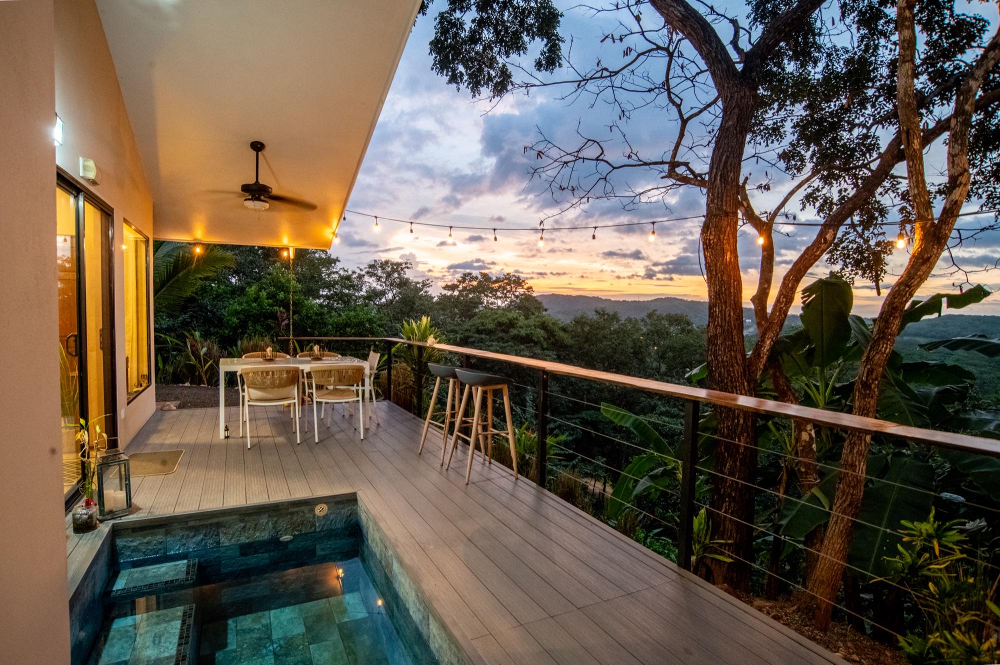 The private plunge pool at Casa Lunax, ocean and mountains beyond